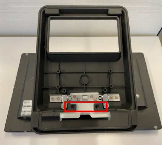 adding screws to stand to set the bracket arm angle